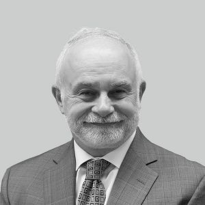 Charles Welge headshot in black and white