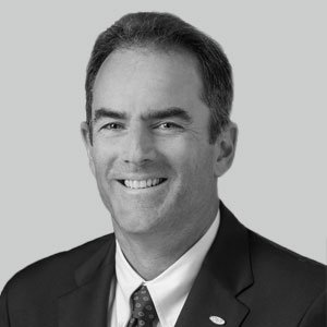 Brian O'Grady headshot in black and white