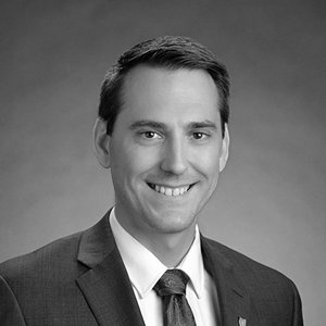Jeremiah Benoit headshot in black and white