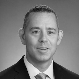 Eric Linzer headshot in black and white