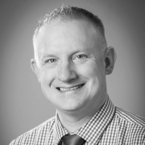 Kevin Gallagher headshot in black and white