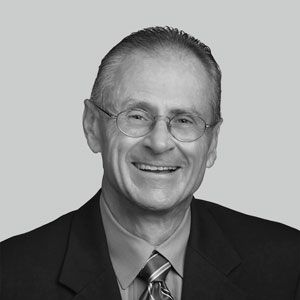 Paul F. Macielak headshot in black and white